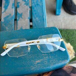 Buff Gold and White Rimless Glasses